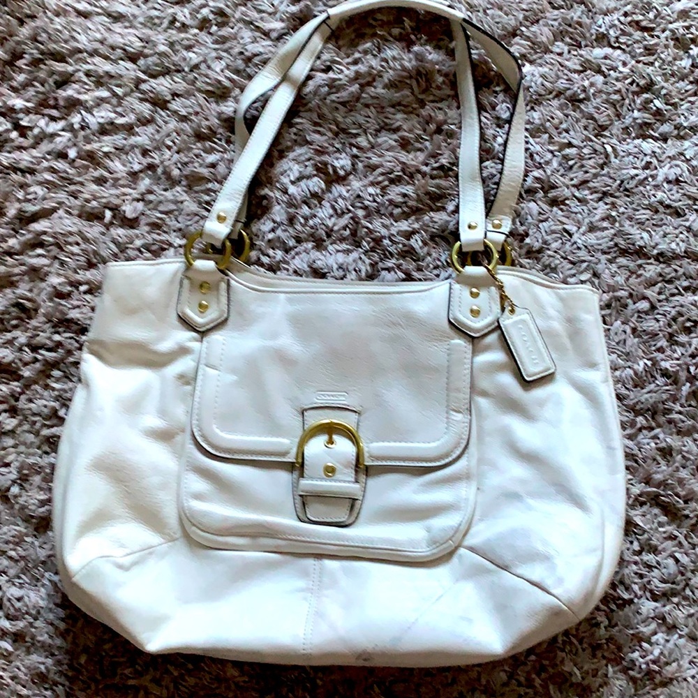 Coach leather purse/handbag beautiful and classy Liz can fit A-4 size papers.